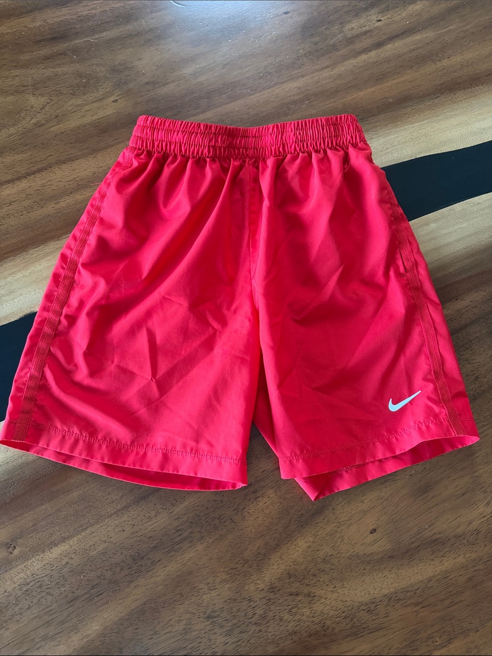 Nike Bright Red Kids Athletic Shorts with White Swoosh